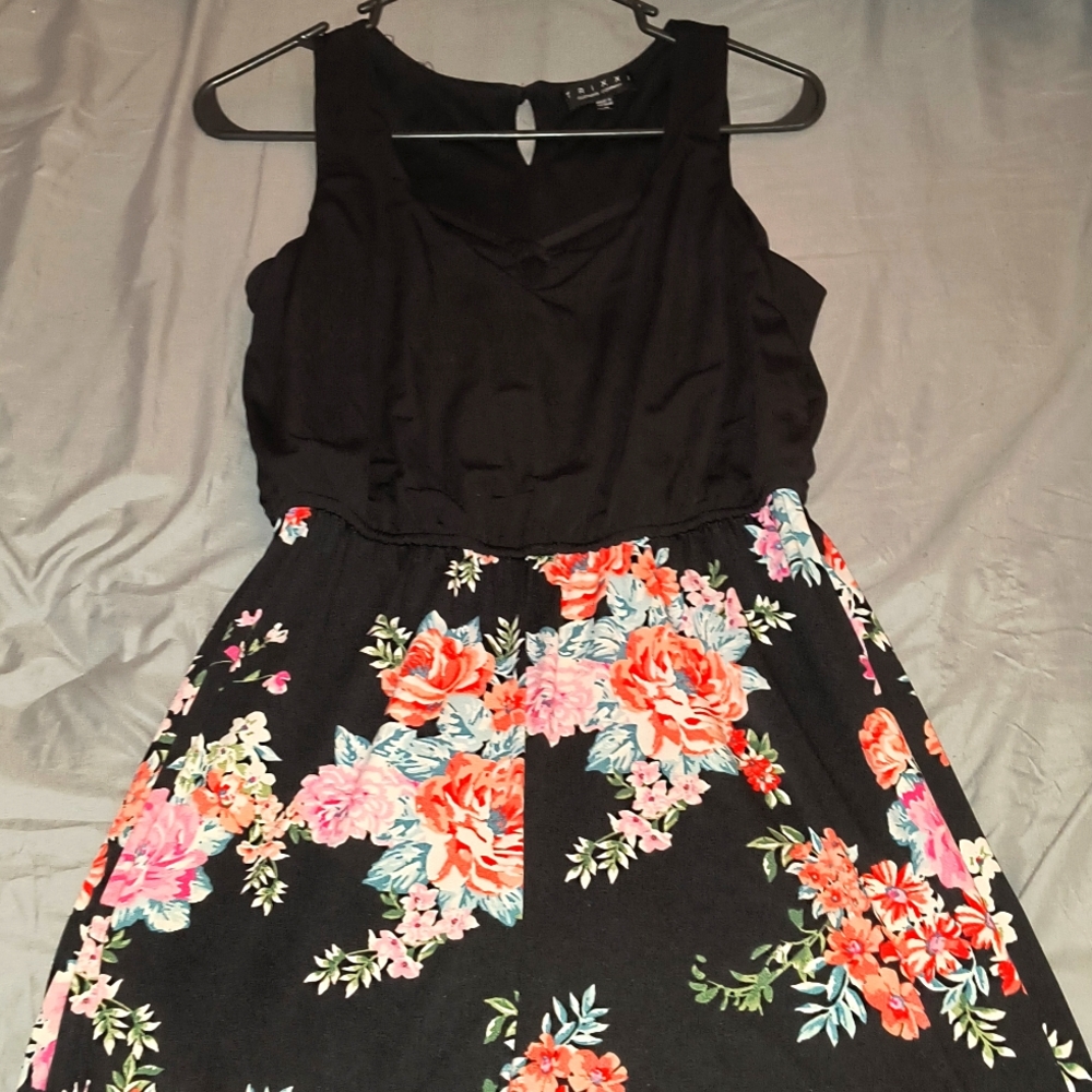 Black and floral print romper. Size Small.
